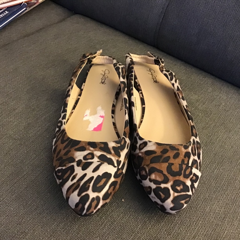 Slip on shoes with open back
